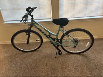 All terrain bike with phone holder and cushion seat