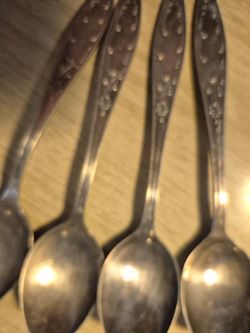 4 vintage Russian or Soviet era silver plated serbing dpoons