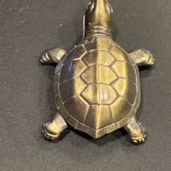 Turtle lighter, butane. Works well