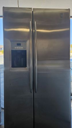 GE stainless steel side-by-side refrigerator with water and ice comes with warranty
