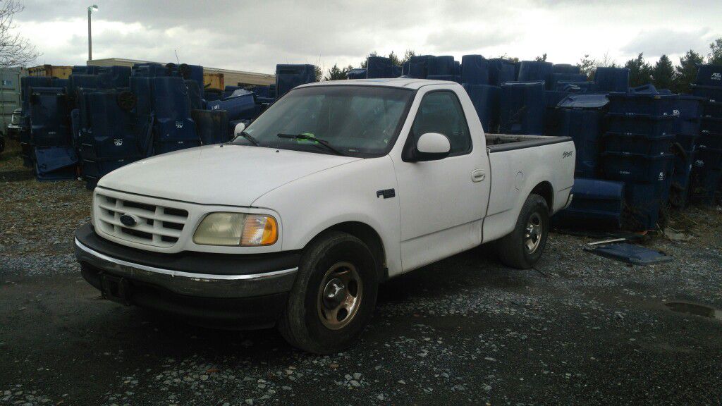 F 150 ,2001. Salvage title. is working good. $600., it'll be selling for part, so anything you need you are welcome to ask and pick up what you need..