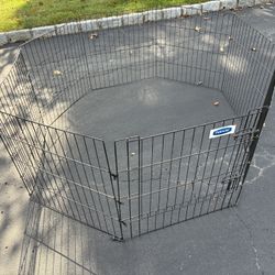 PetMate 8 Panel Wire Dog Exercise Yard Play Pen With Door 24” high. Each panel is 24” wide  folds flat