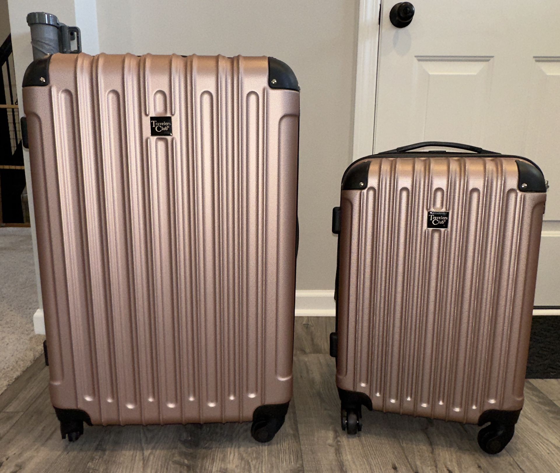 2 Traveler’s Club Midtown Hardside Spinner Suitcases