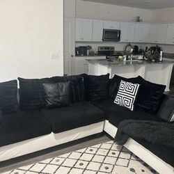 Black and white L shaped couch