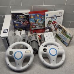 Nintendo WII Bundle With Remotes,Games,Wheels