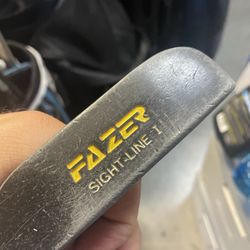 Fazer golf putter in right hand ,