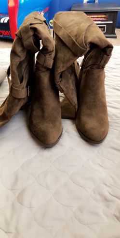 Size 8.5 thigh high boots. Never worn