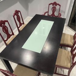 Wooden Dining table with frosted glass center.  Beautiful