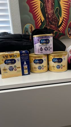 Enfamil gentle ease and regular enfamil neuro pro with enfamil bottles come w small bottle tops