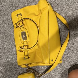 Bright yellow Michael Kors purse with matching wallet