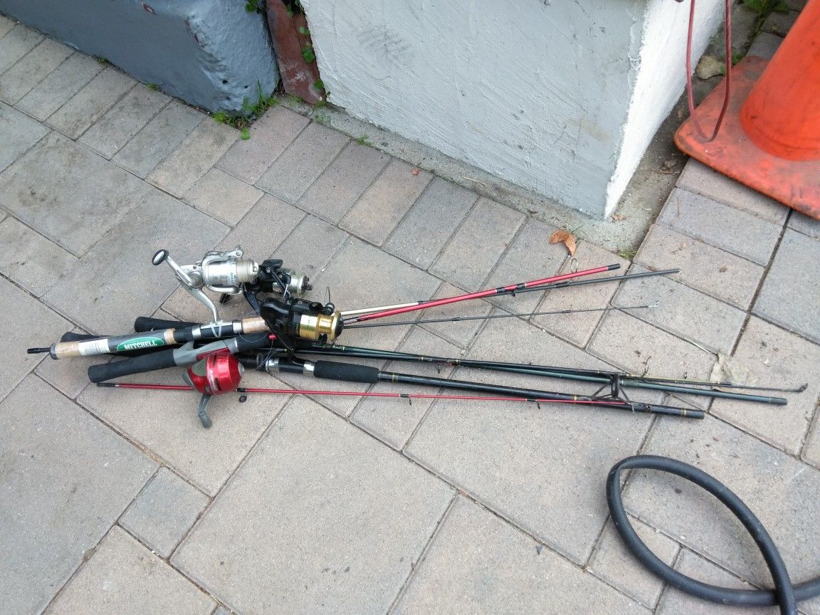 4 fishing rods and reels