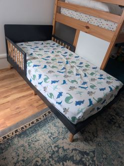 Delta Toddler bed with Sealy mattress and memory foam mattress topper