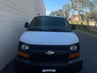 White Chevrolet Express Cargo Van