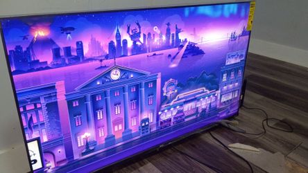 50 inch Roku TV screen plastic still on.