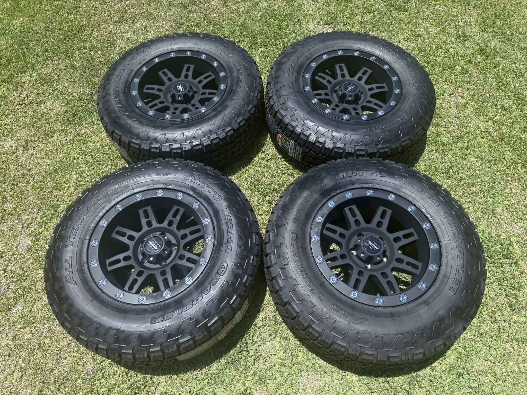 (4) 16” Pro Comp Wheels 265/70R16 Nitto All Terrain - $1550