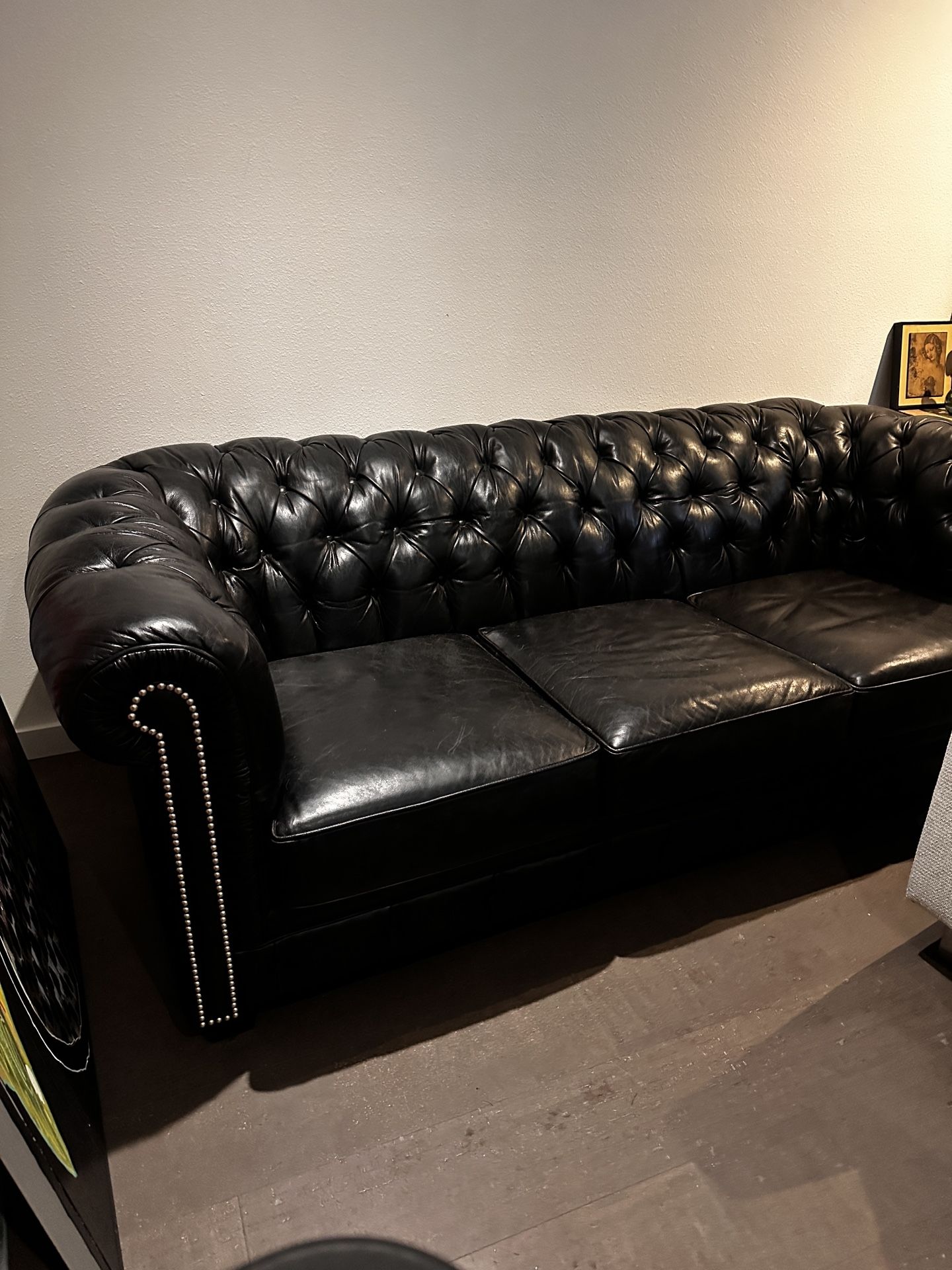 Black Tufted Leather Sofa 