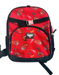 This red Disney Pixar Cars Lightning McQueen character backpack features an all-over print of Lightning McQueen and Piston Cup motifs, complete with a