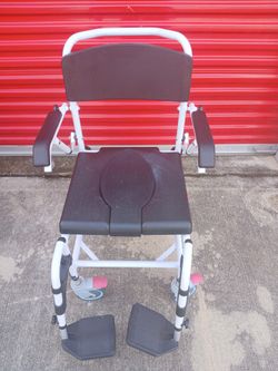 ADJUSTABLE ROLLING SHOWER CHAIR USED A FEW TIMES. VERY STURDY. $100 0B0