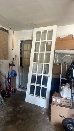 Two tall glass window doors