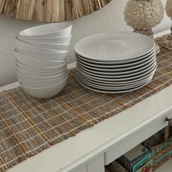 12 White Plates And 11 White Bowls