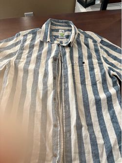 Brand new men’s shirt, $10 located in Riverside