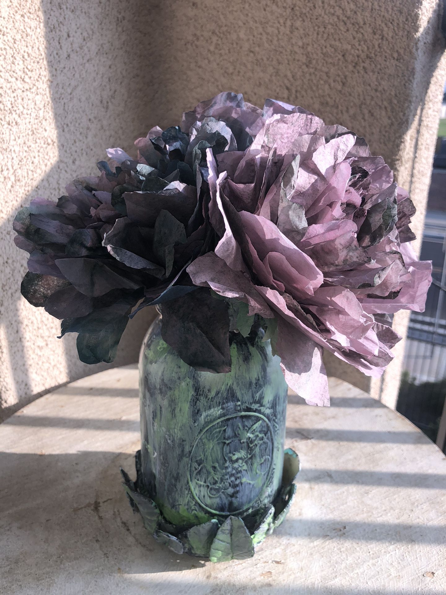 Handmade flowers with painted jar
