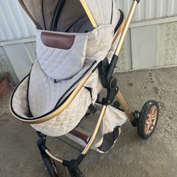 Stroller With Car seat. And Bassinet. Base net. Has A Stain. It Can Be. Removed