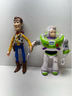 Disney 12” woody and 10” Buzz