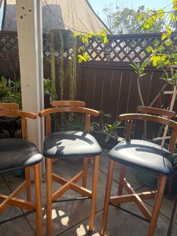 Set of 3 Wood Barstools Curved Backrest, Black Padded Seat, Brown Frame