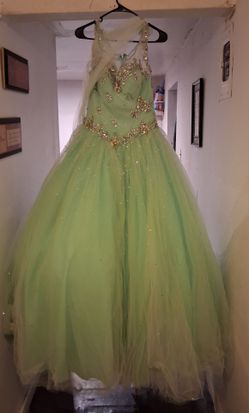 pastel green quincerina dress with bouquet and tiara maroon quincerina dress and formal dress