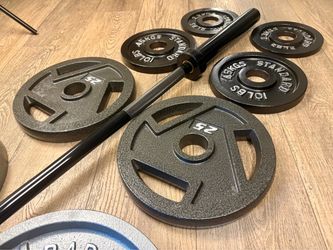 Beautiful NEW Equipment: 6 ft Steel Olympic Bar with Pairs of Weight Plates: 45s, 35s, 25s, 10s and 5s. Total: 282 lbs