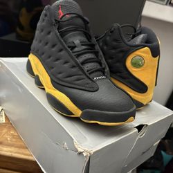 Black And Yellow Jordan 13s 