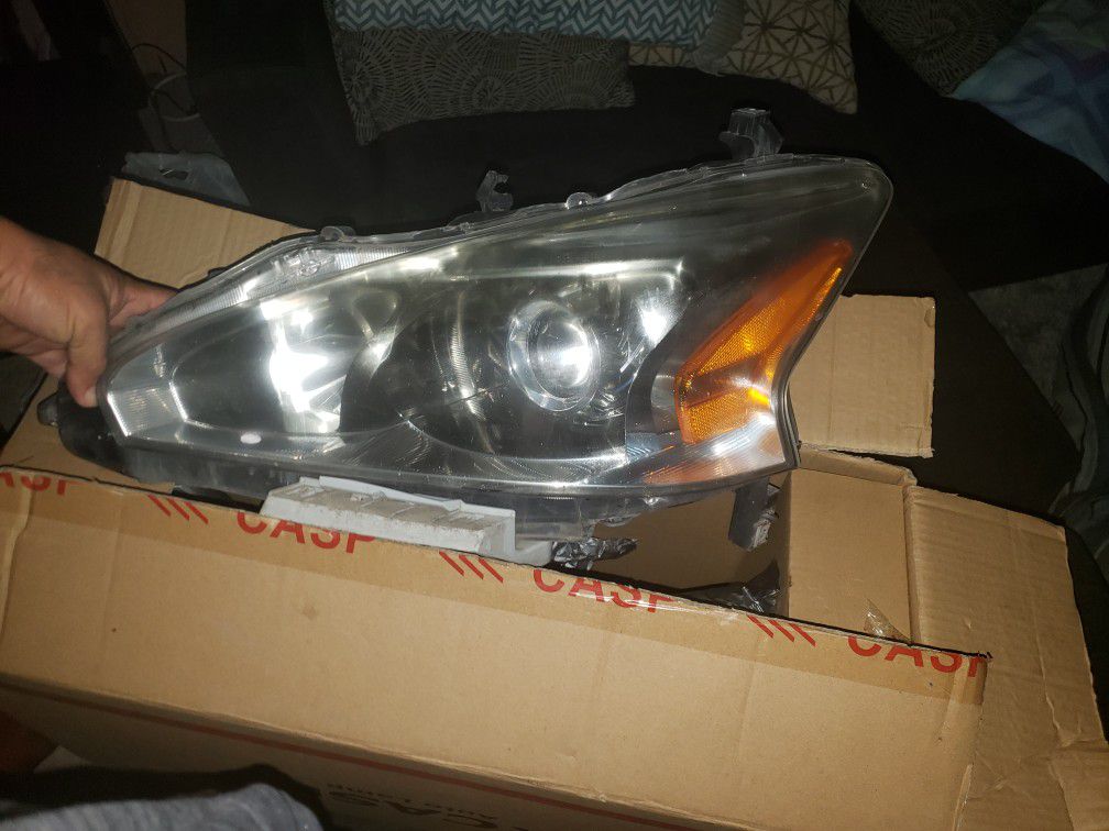 2013 headlight assembly used needs cleaning