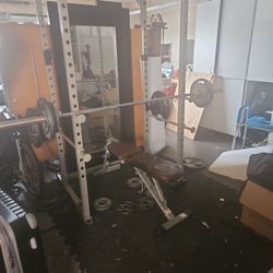 MOVING SALE: WEIGHTS AND BENCH AND CAGE