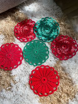 Hand knitted christmas coasters