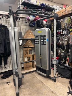 TechnoGym dual adjustable pulley functional trainer with two 100 pound weight stacks