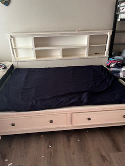 Queen size bed frame Ashley’s Furniture