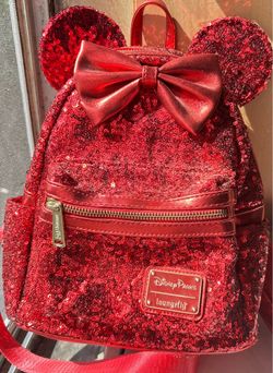 Disney Parks Loungefly Minnie Mouse mini backpack featuring an all-over red sequin design with 3D ears and a metallic bow