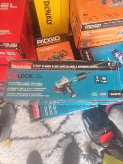 MAKITA 4-12IN X-LOCK SLIDE SWITCH ANGEL GRINDER AC,DC