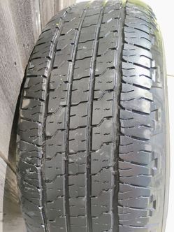 One Goodyear 265/65/18 tire