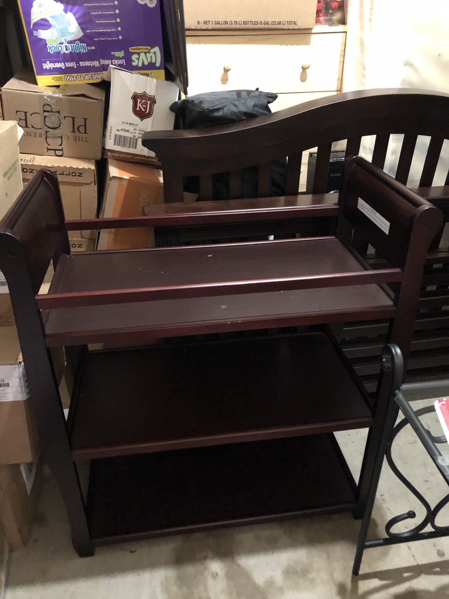 Dark brown wood changing table