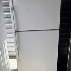 White GE Refrigerator And Freezer