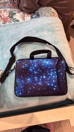 The specific starry galaxy neoprene 13x9.5 inch laptop shoulder bag shown in the image