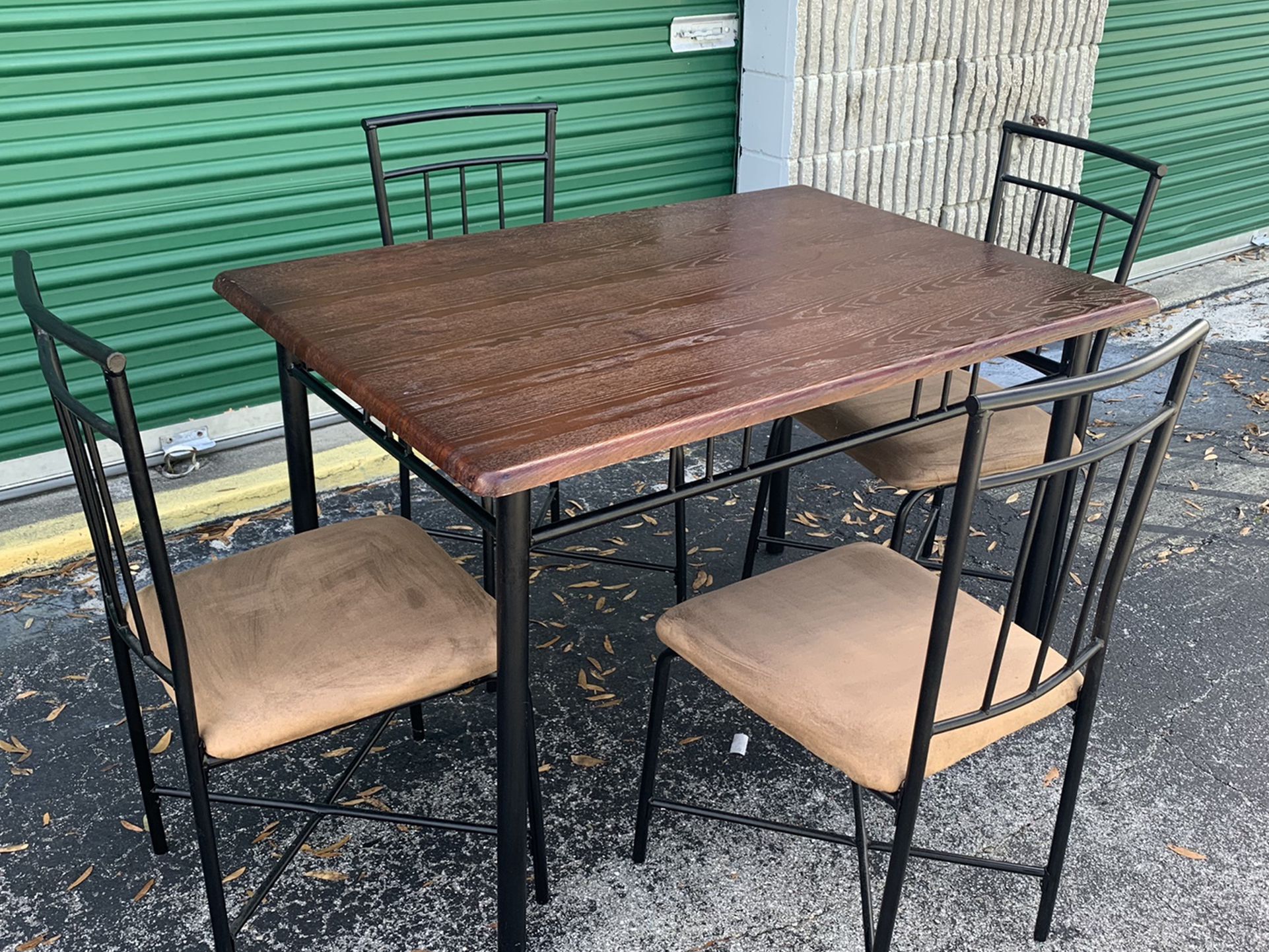 Cute Kitchen / Dining Room Table With 4 Metal Chairs With Microfiber Cushions. Table measures 46" long x 32" deep x 30.5" tall