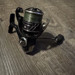 Daiwa Tatula MQ 2500 Spinning Fishing Reel. 