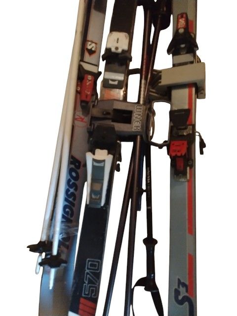 Three Pairs Of Snow Skis 