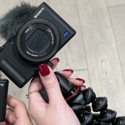 SONY ZV1 (Will sell with flash attachment, tripod, case and battery, will also add the charger for the camera.)