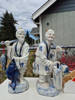 Chinese porcelain fisherman figurines
