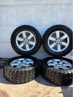 20 inch Nissan Titan and Armada wheels with 98% tires!!