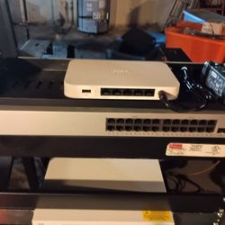 Meraki Router And 24 Port PoE Switch.